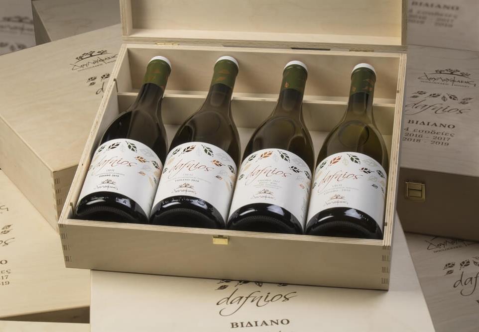 A wooden case collection of 4 different vintages of Dafnios White.